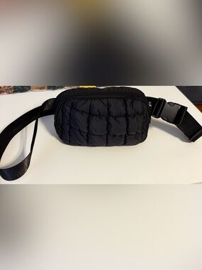 NWOT Black quilted puffy waist bag features a soft, grid-quilted black nylon.